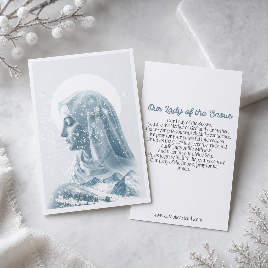 Front and back of Our Lady of the Snows prayer card with prayer text, on marble with frosted branches